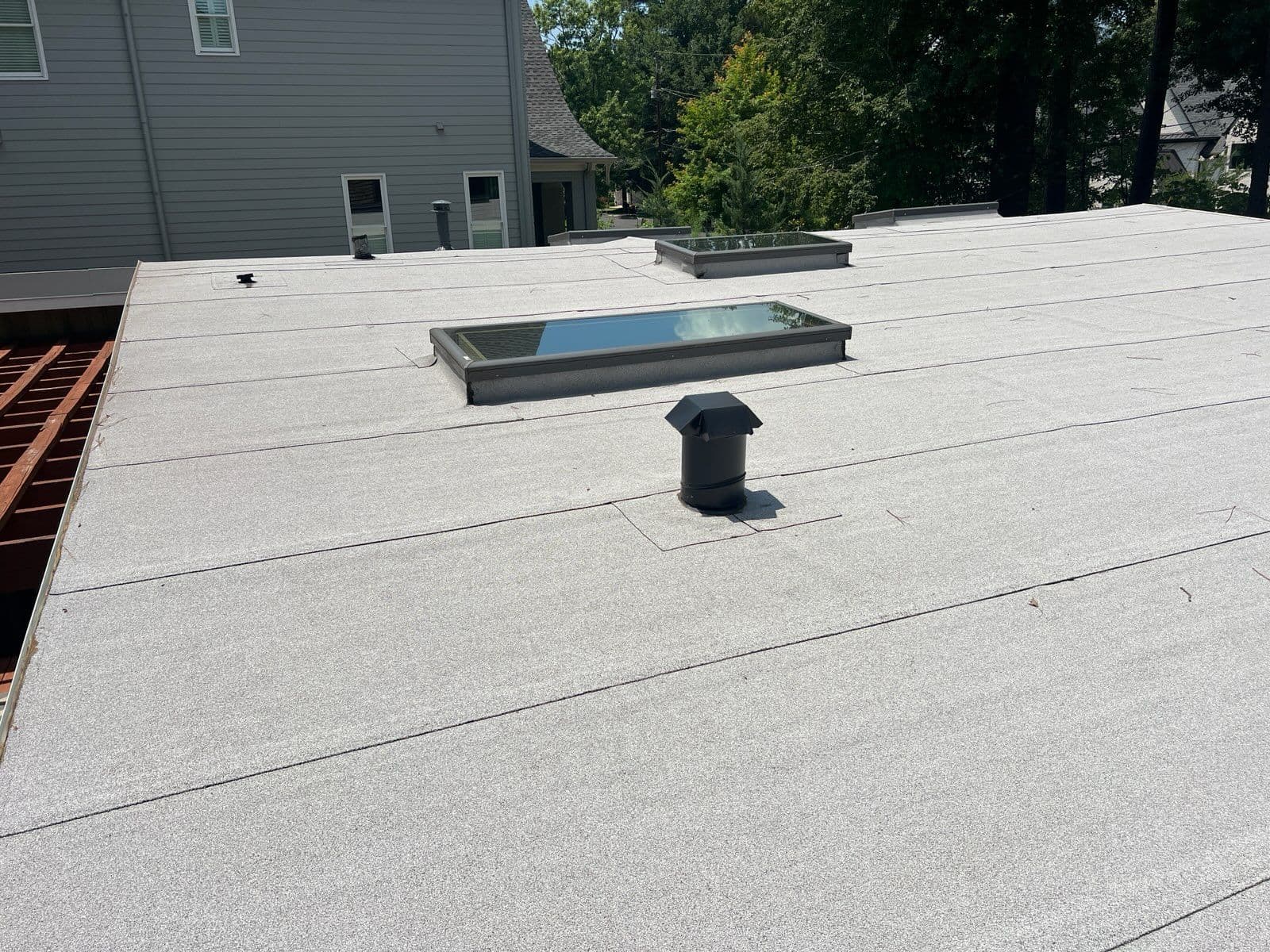 Sleek Flat Roof with Skylights in Brookhaven GA image