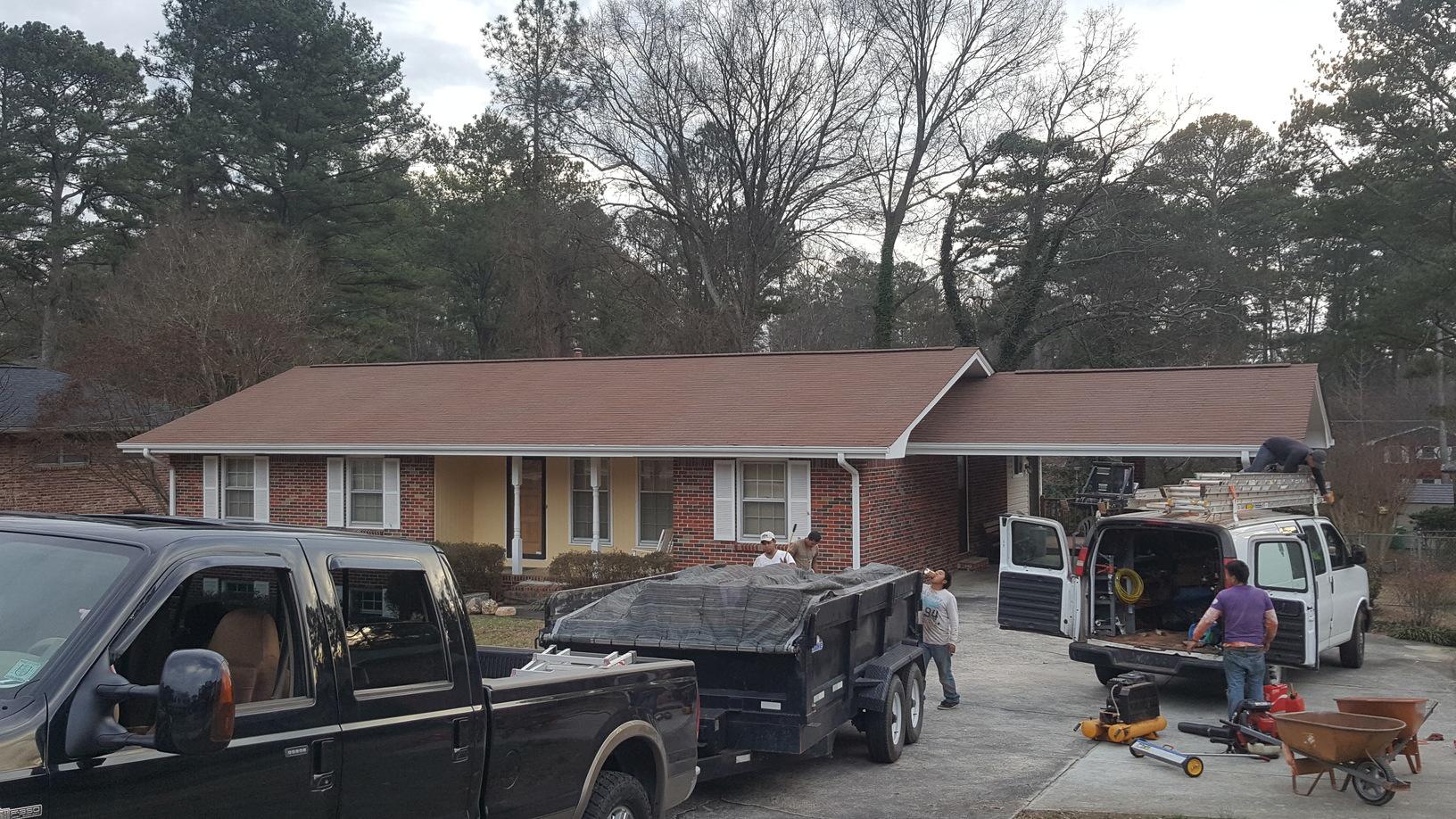 Griffin Roofing in Atlanta, GA - picture showing roof replacement on a house