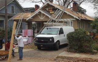 Griffin Roofing in Atlanta, GA - Roofers are repairing an old roof